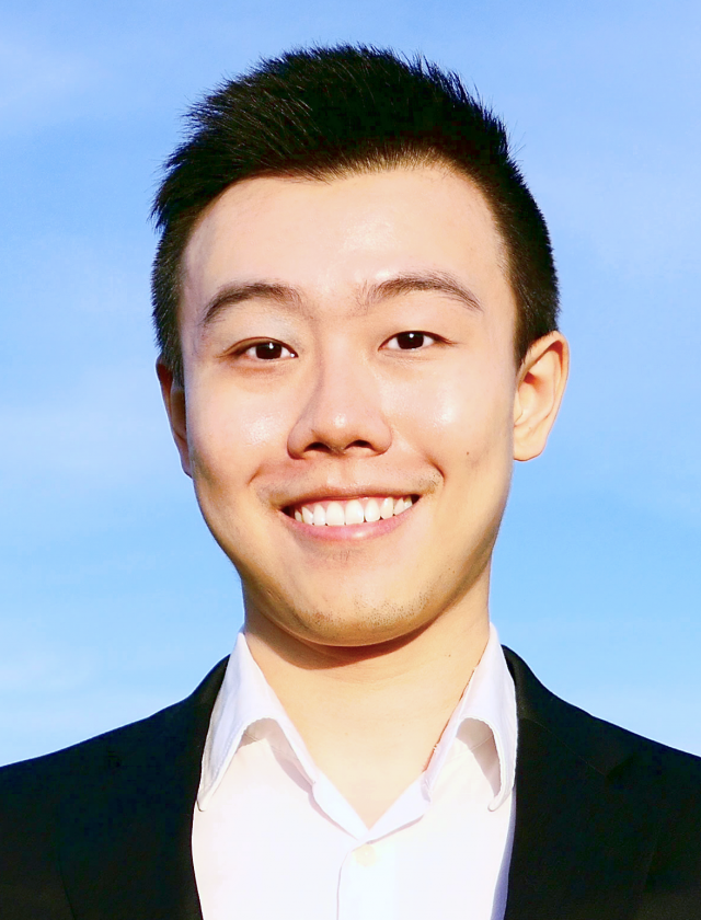 A headshot photo of Y. Andre Wang