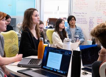 A student presenting during a Learning and Neural Development (LAND) Lab Meeting